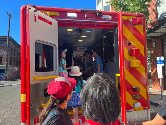 kids exploring ambulance